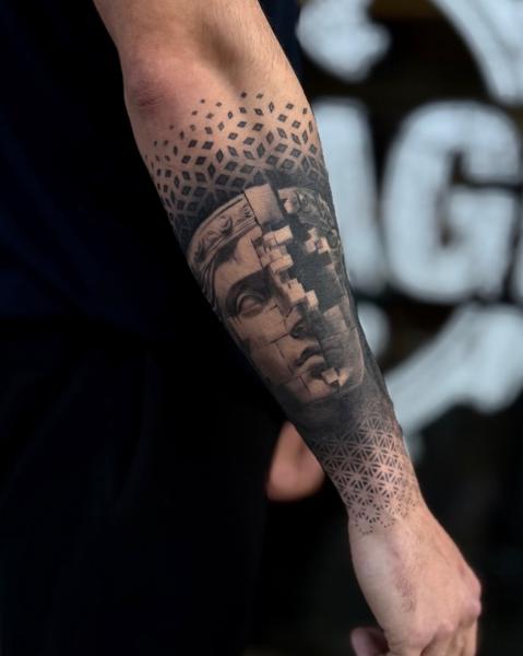 Realism geometric statue tattoo by @garagetattooshop