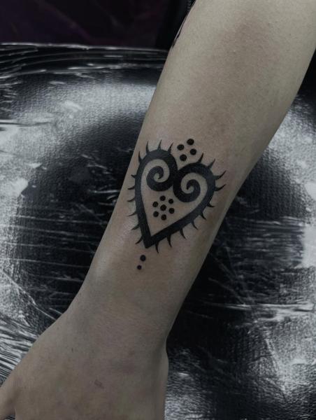 Tribal tribal heart tattoo by @nerilink