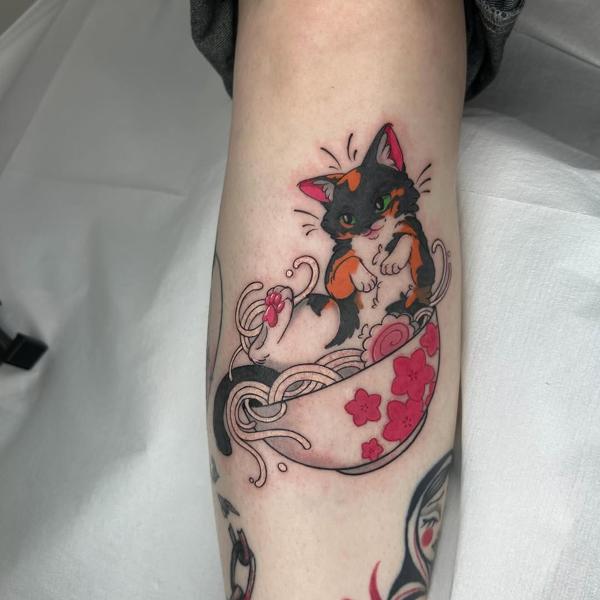 Anime cat in teacup tattoo by @myboo_tattoo