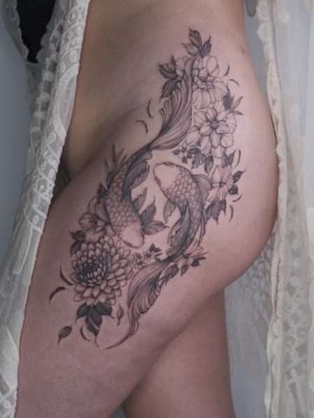 Illustrative floral koi fish tattoo by @marisatattooartist