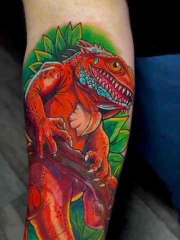 New school red raptor tattoo by @mariusz_detka_tattoo