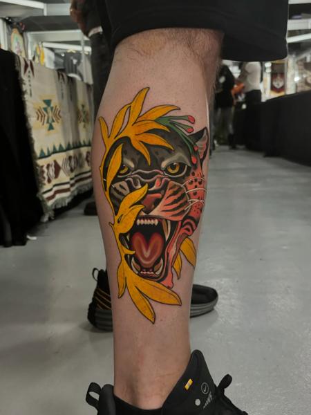 Traditional jaguar head tattoo by @mvrktattoo