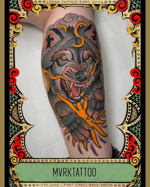 Traditional wolf head tattoo by @mvrktattoo