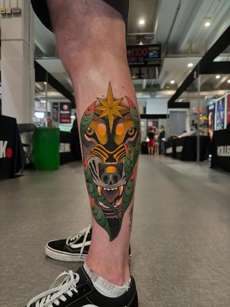 Traditional wolf mask tattoo by @mvrktattoo