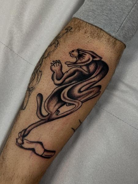 Traditional panther tattoo by @quipstertattoos