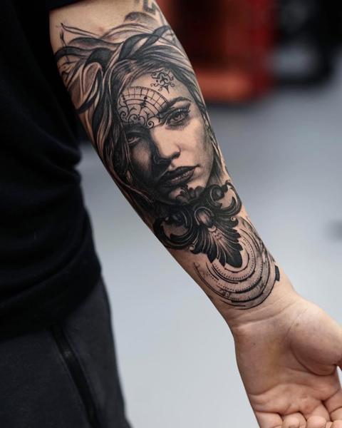 Realism ornamental woman portrait tattoo by @markwosgerau