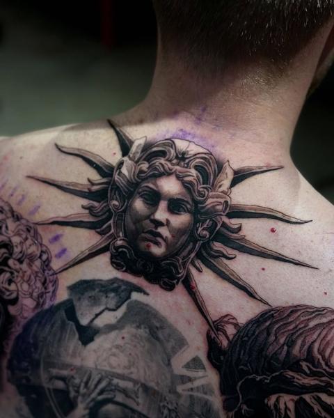 Realism classical sun face tattoo by @markwosgerau