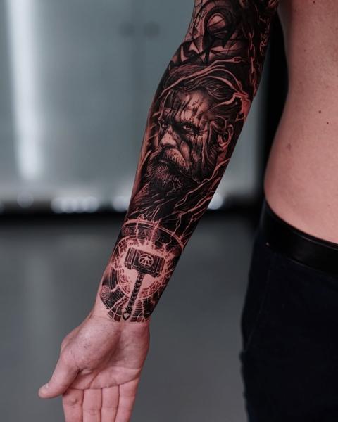Realism viking portrait tattoo by @markwosgerau