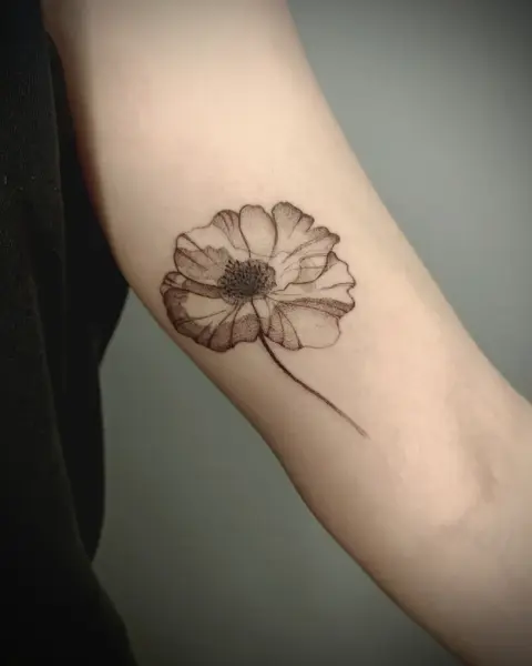 Dotwork single flower tattoo by @martatattoos
