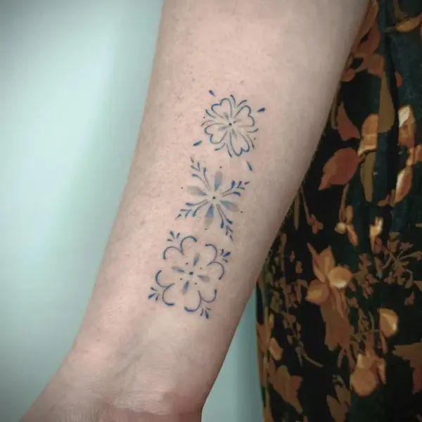 Fine line floral patterns tattoo by @martatattoos