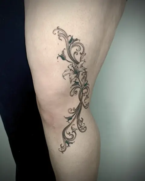 Ornamental ornamental lily tattoo by @martatattoos