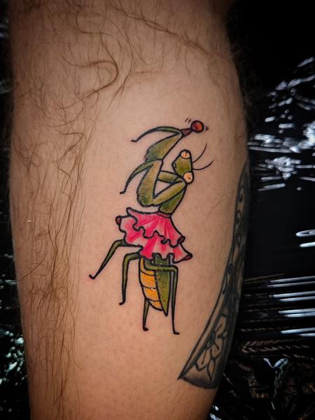 Traditional juggling mantis tattoo by @marthmallow.tatts