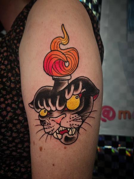 American traditional flaming panther head tattoo by @marthmallow.tatts