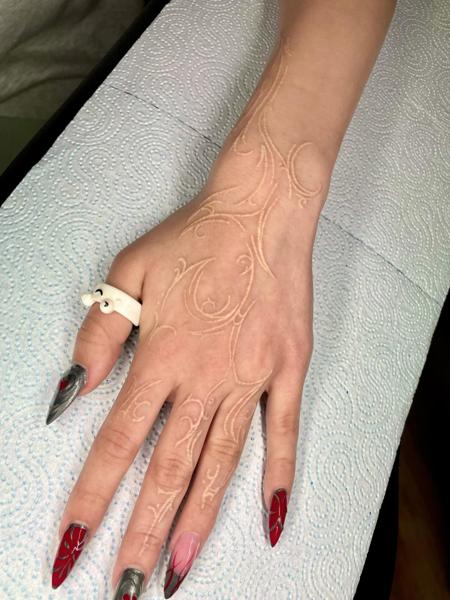 White Ink ornamental design tattoo by @mate.arnoth.tattoos