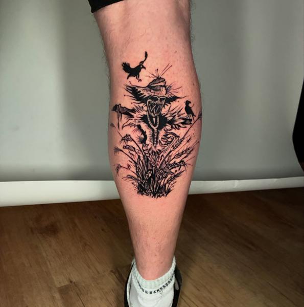 Blackwork scarecrow tattoo by @mate.arnoth.tattoos