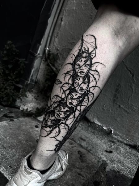 Blackwork multiple faces tattoo by @matina_macabre_tatt