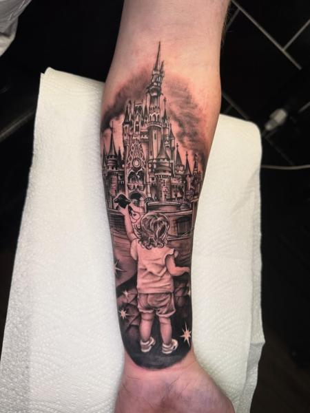 Realism castle and child tattoo by @mattedwardstattoos