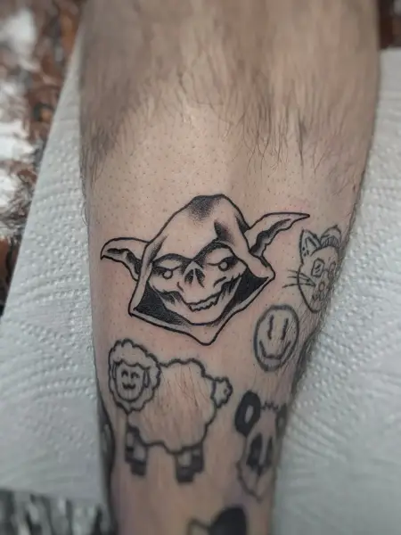 Blackwork hooded skull tattoo by @fearn_tattoo