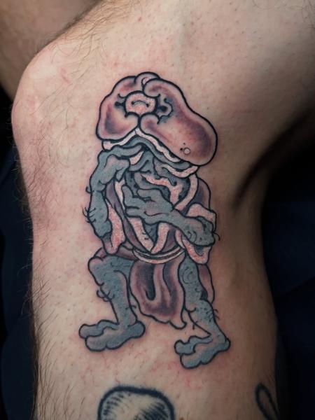 Illustrative brain creature tattoo by @matt.ono.tattoo