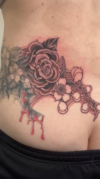 Blackwork floral rose tattoo by @matt.ono.tattoo
