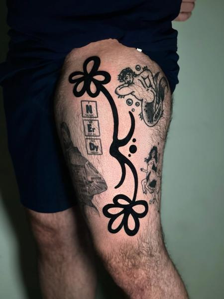 Blackwork abstract flowers tattoo by @mattylism
