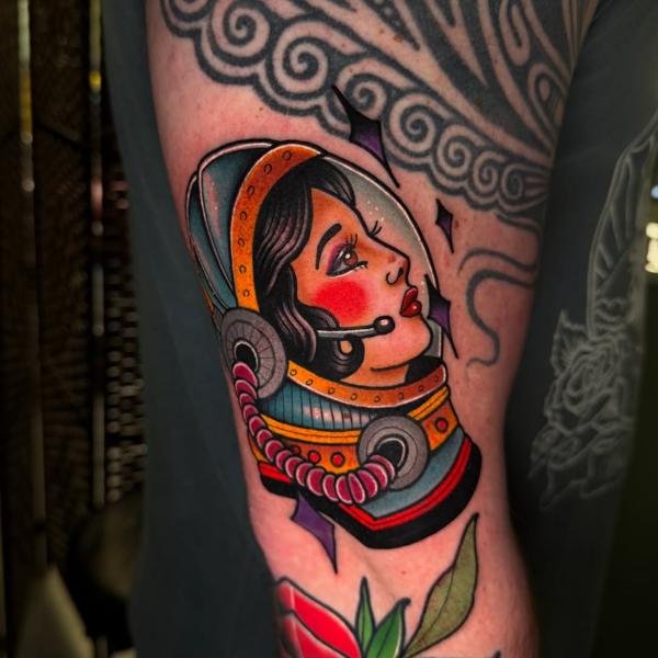 Traditional astronaut woman tattoo by @mattwebbtattoo