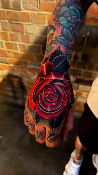 Traditional red rose tattoo by @mattwebbtattoo
