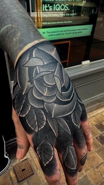 Blackwork geometric rose tattoo by @mattwebbtattoo