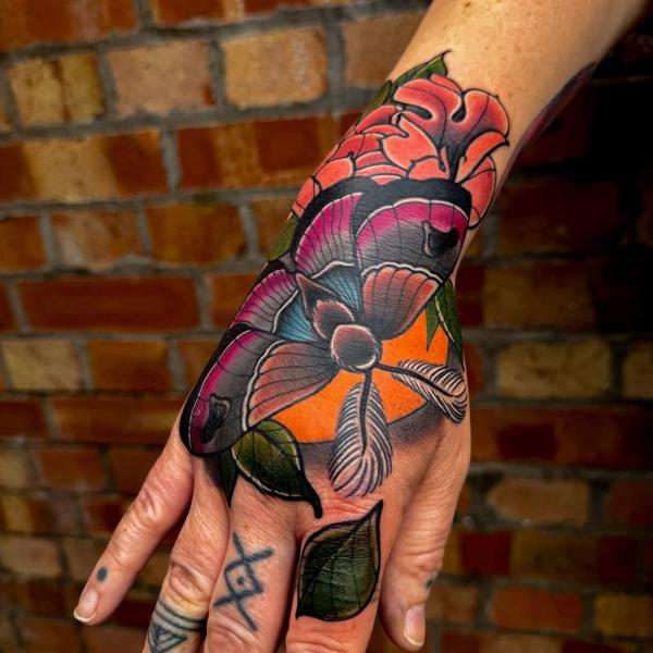 Traditional floral design tattoo by @mattwebbtattoo