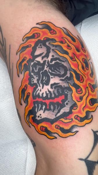 Traditional flaming skull tattoo by @mattygoldstein