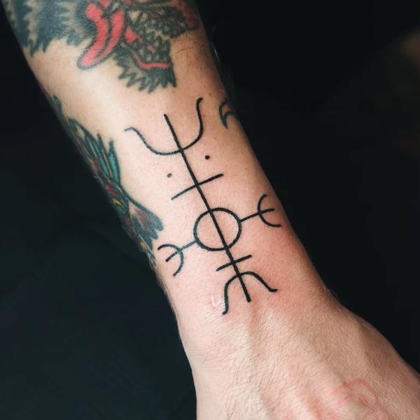 Fine Line abstract symbol tattoo by @meelarainey_tattoo