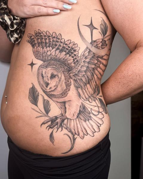 Illustrative blackwork celestial owl tattoo by @meganbirdtattoo