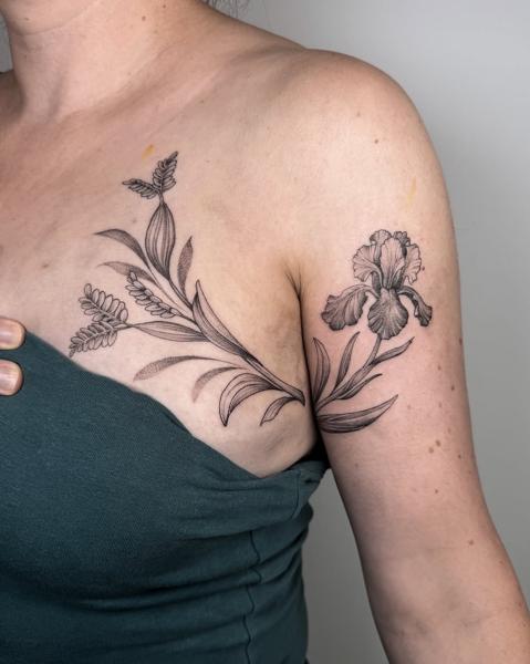 Fine line floral iris tattoo by @meganbirdtattoo