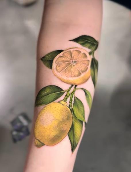 Realism lemon branch tattoo by @meganhoogland