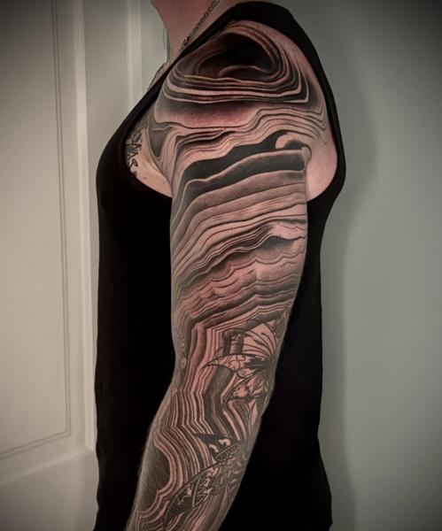 Blackwork geometric pattern tattoo by @meganhoogland