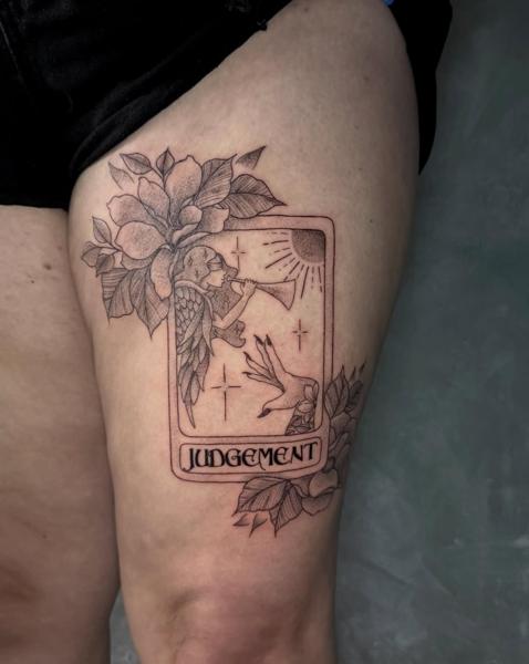 Fine line blackwork floral tarot card tattoo by @megz.ink