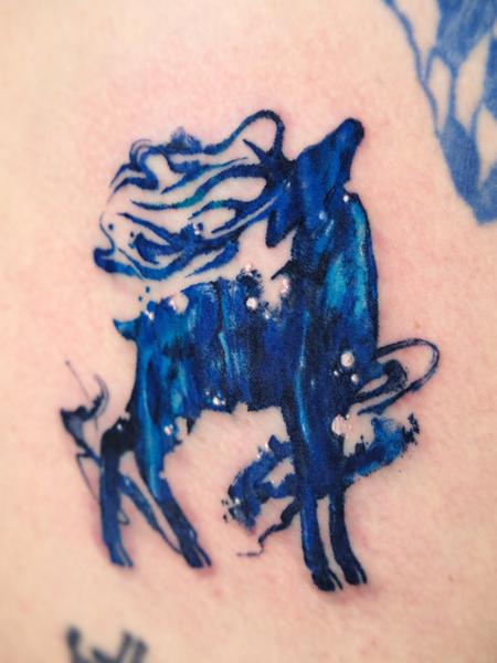 Watercolor abstract wolf tattoo by @melange.tattoo
