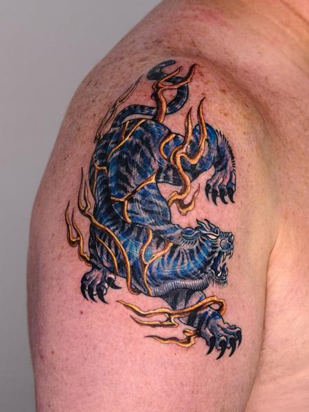 Japanese tiger with flames tattoo by @melange.tattoo