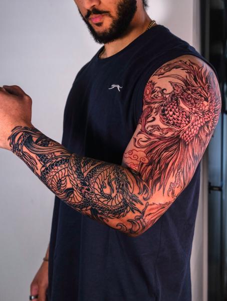 Japanese phoenix and dragon tattoo by @melange.tattoo