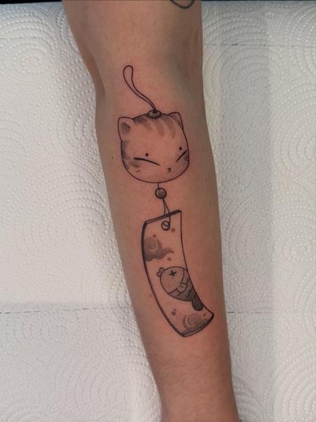 Fine line cat charm tattoo by @hunn1i