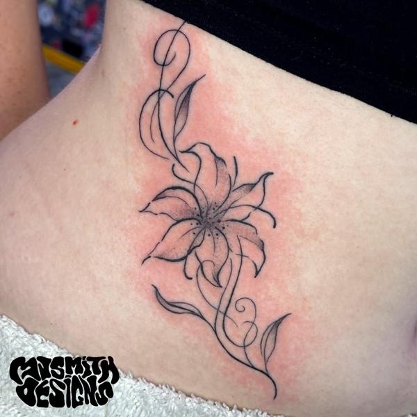 Fine line floral lily tattoo by @mjsmith_designs