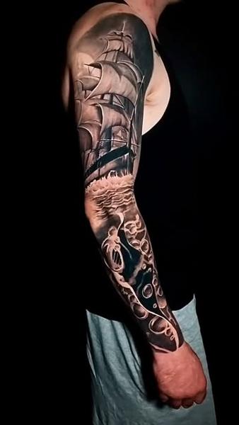 Realism sailing ship kraken tattoo by @michal_zak_tattoo