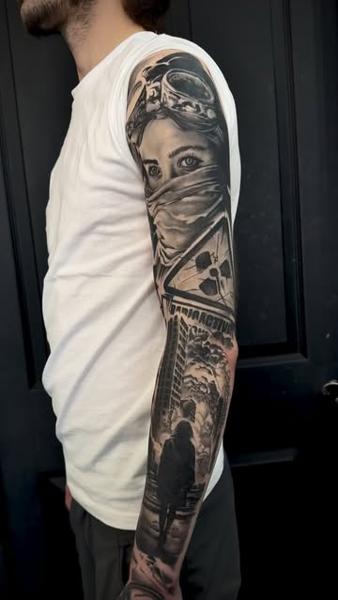 Realism dystopian scene tattoo by @michal_zak_tattoo