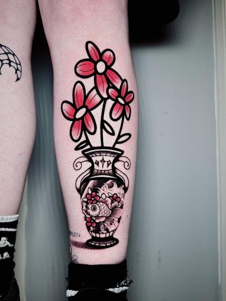 Traditional flower vase tattoo by @miguel.tattooer