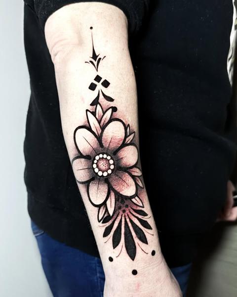 Ornamental ornamental flower tattoo by @miguel.tattooer