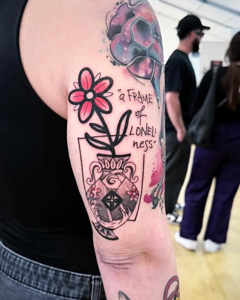 Traditional flower vase tattoo by @miguel.tattooer