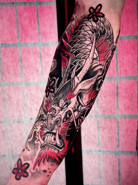 Japanese dragon head tattoo by @miguel.tattooer