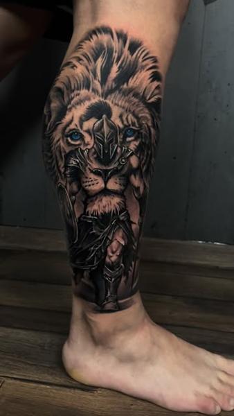 Realism lion warrior tattoo by @miketattoo1320