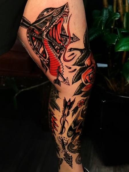 Traditional cobra and roses tattoo by @mikeysharks