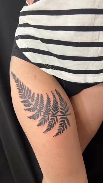 Blackwork fern leaves tattoo by @mikotattoo